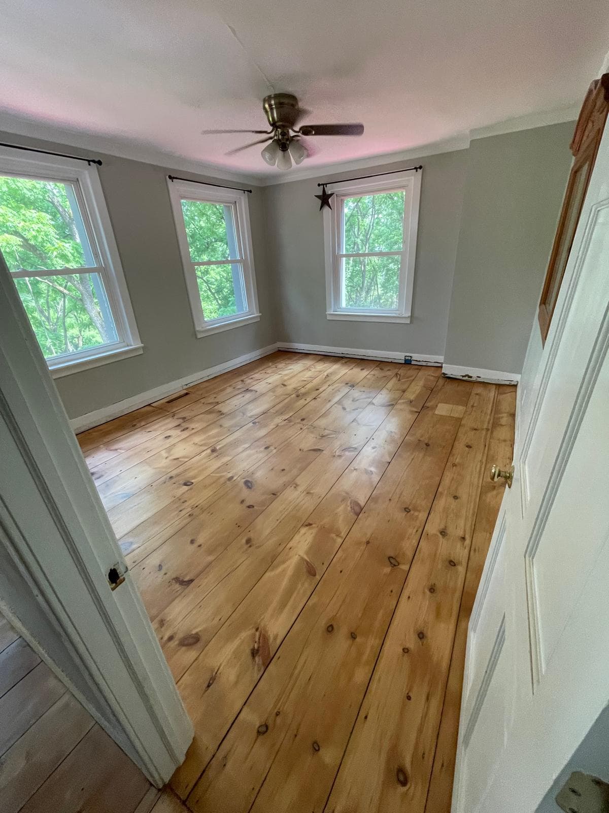 Repaired and refinished hardwood floor looking like new in Randolph NJ